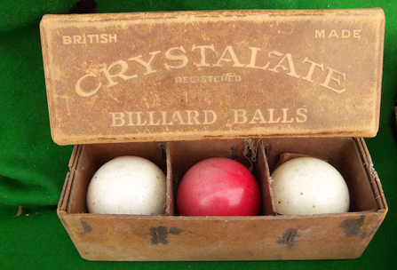 Box of crystalate billiard balls