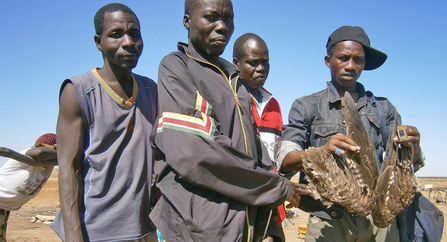 Oumar and men from village, with Ceulan's wings and tracker