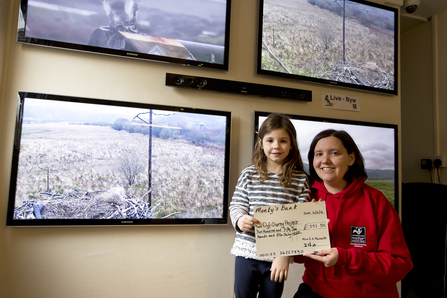 MWT - Dyfi Opsrey Project volunteer receiving donation