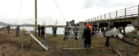 MWT - Volunteers carrying scaffolding from Dyfi Junction to the nest